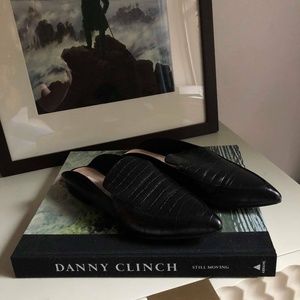Black leather mules by Chinese Laundry